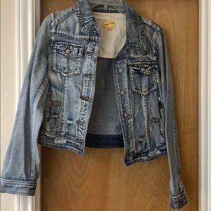 Distressed denim jacket